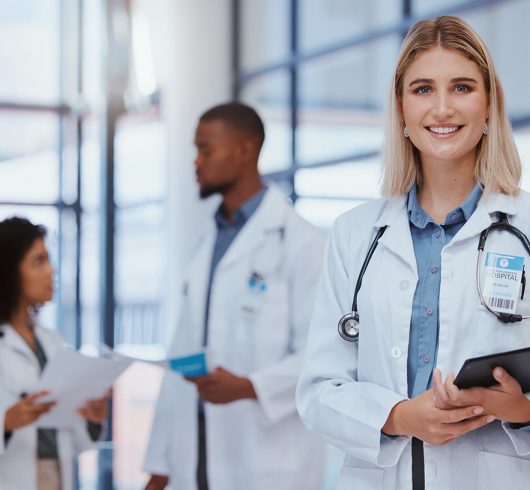 woman-team-portrait-doctor-with-tablet-hospital-female-doctor-smiling-diversity-healthcare-medicine-medical-care-with-doctors-smiling-standing-talking